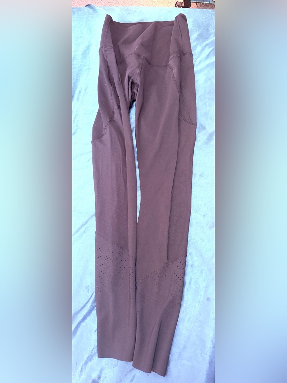 #9 Lululemon leggings with laser cut perforated detailing lower leg full length